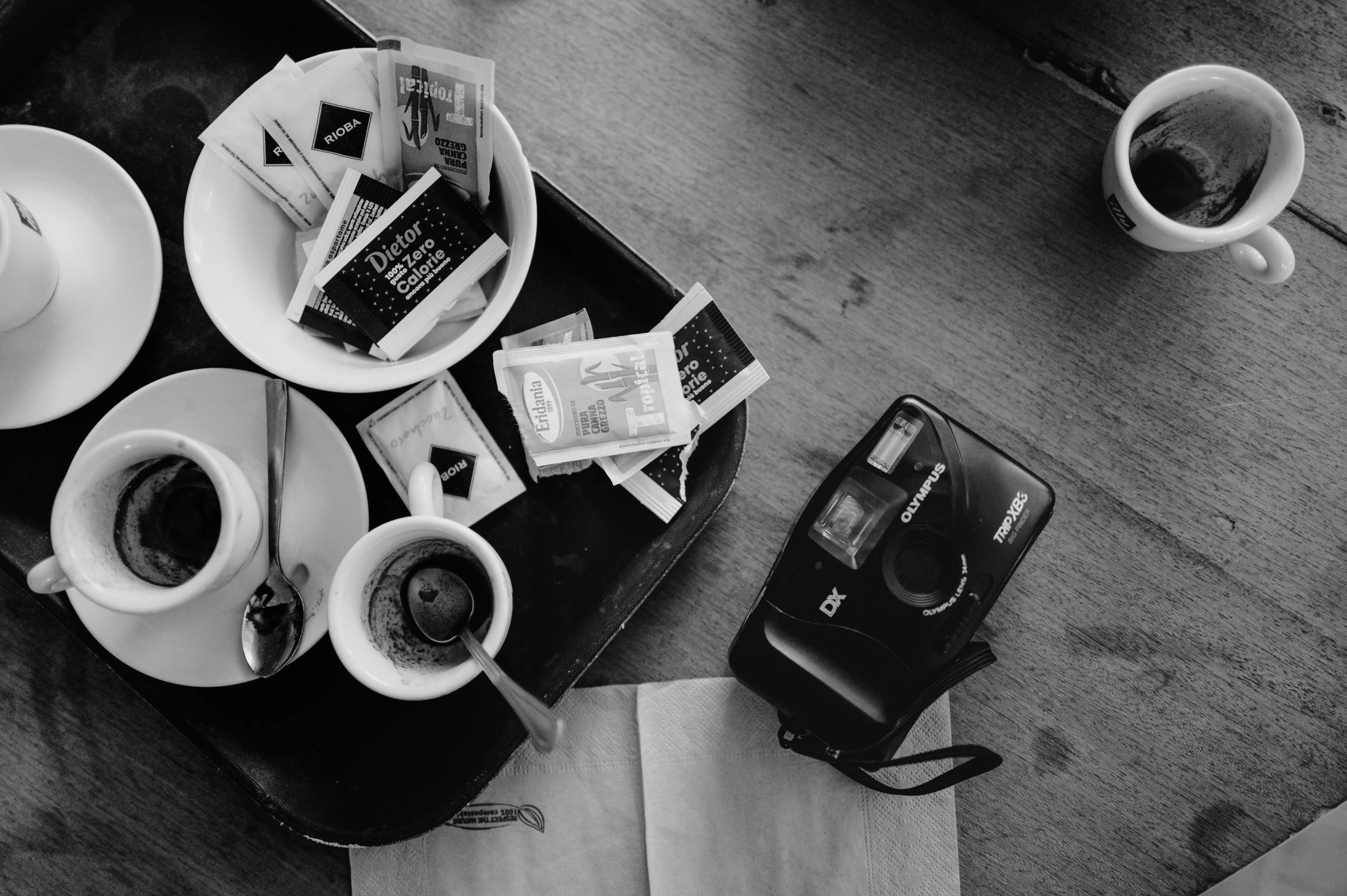 Vintage camera and espresso coffee during wedding morning preparations in Sicily